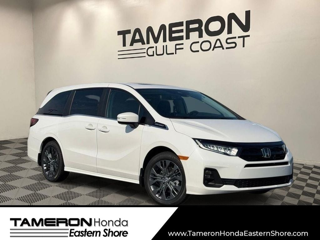 2026 Honda Odyssey Touring in Platinum White Pearl — front three-quarter view